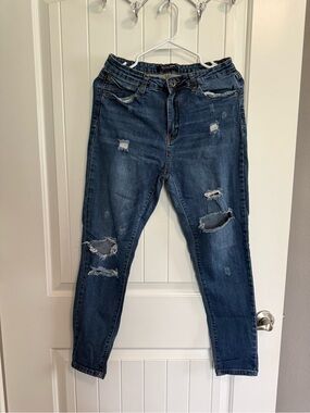 Distressed Dark Blue Women’s Jeans
